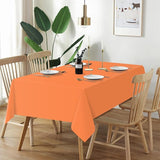 QIKSION Orange Plastic Table Cloth Disposable 12 Pack, 54 x 108 Inch